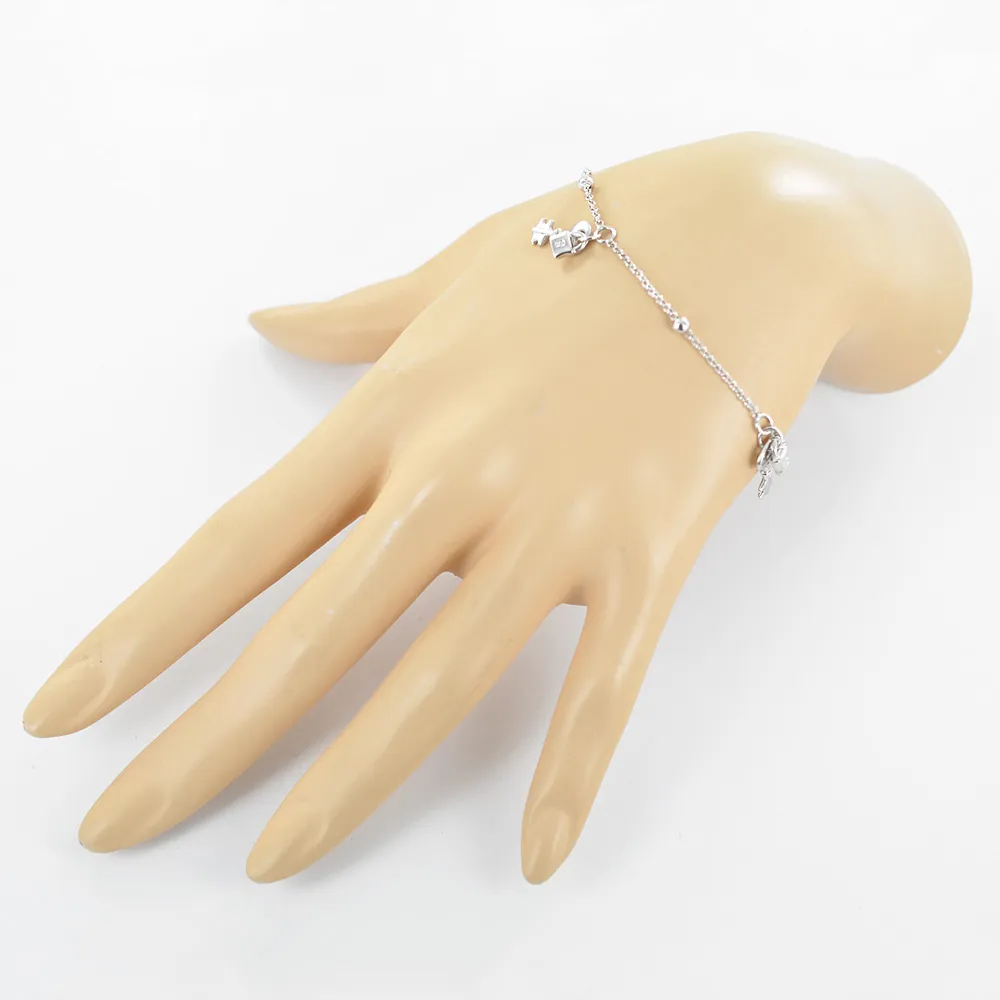 Bracciale da bambina in oro bianco lucchetto e chiave