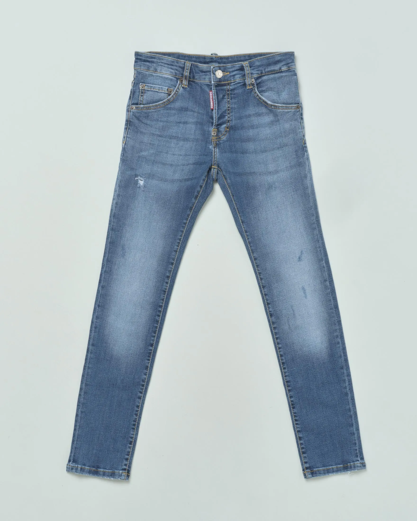 Jeans lavaggio medio stone washed in cotone stretch con piccole rotture e abrasioni 12-16 anni
